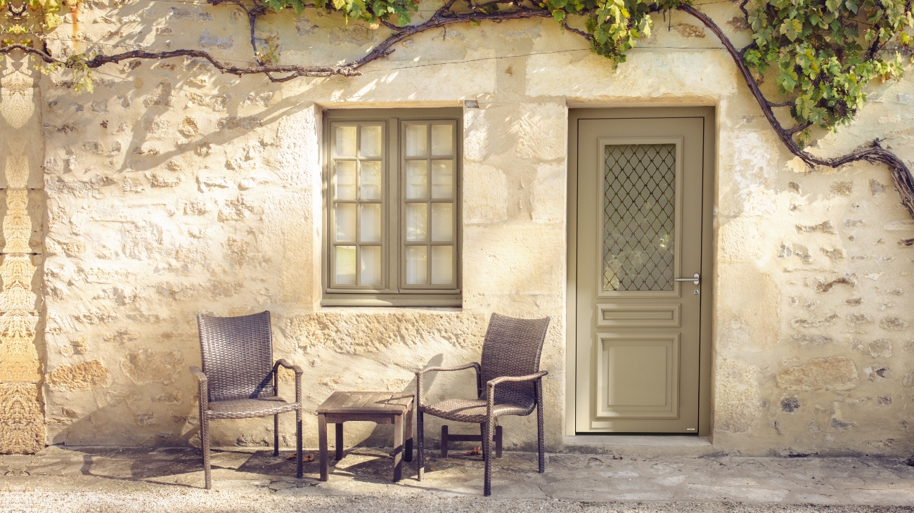 Wooden front doors with several panels